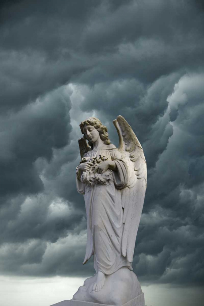 Artistic creation of angel and dark clouds